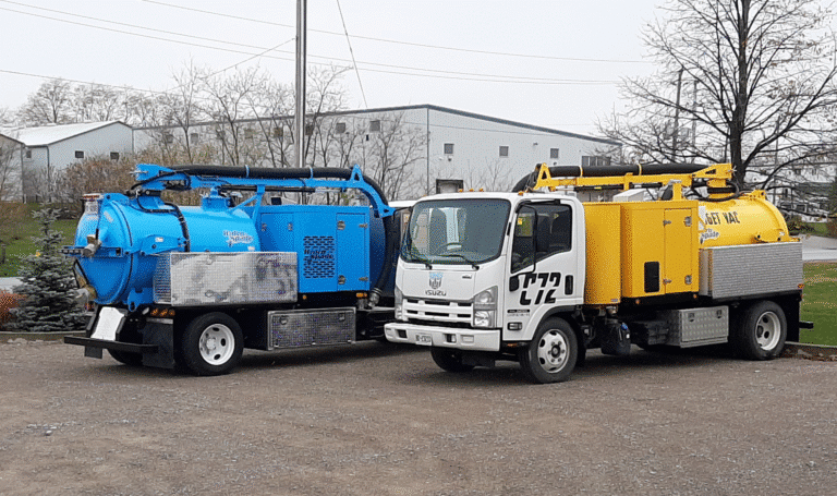 Colorful blue and yellow trucks ready for transportation and operational tasks.