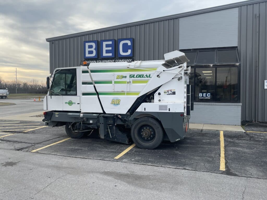Global Environment Products R3 air street sweeper parked outside BEC facility.