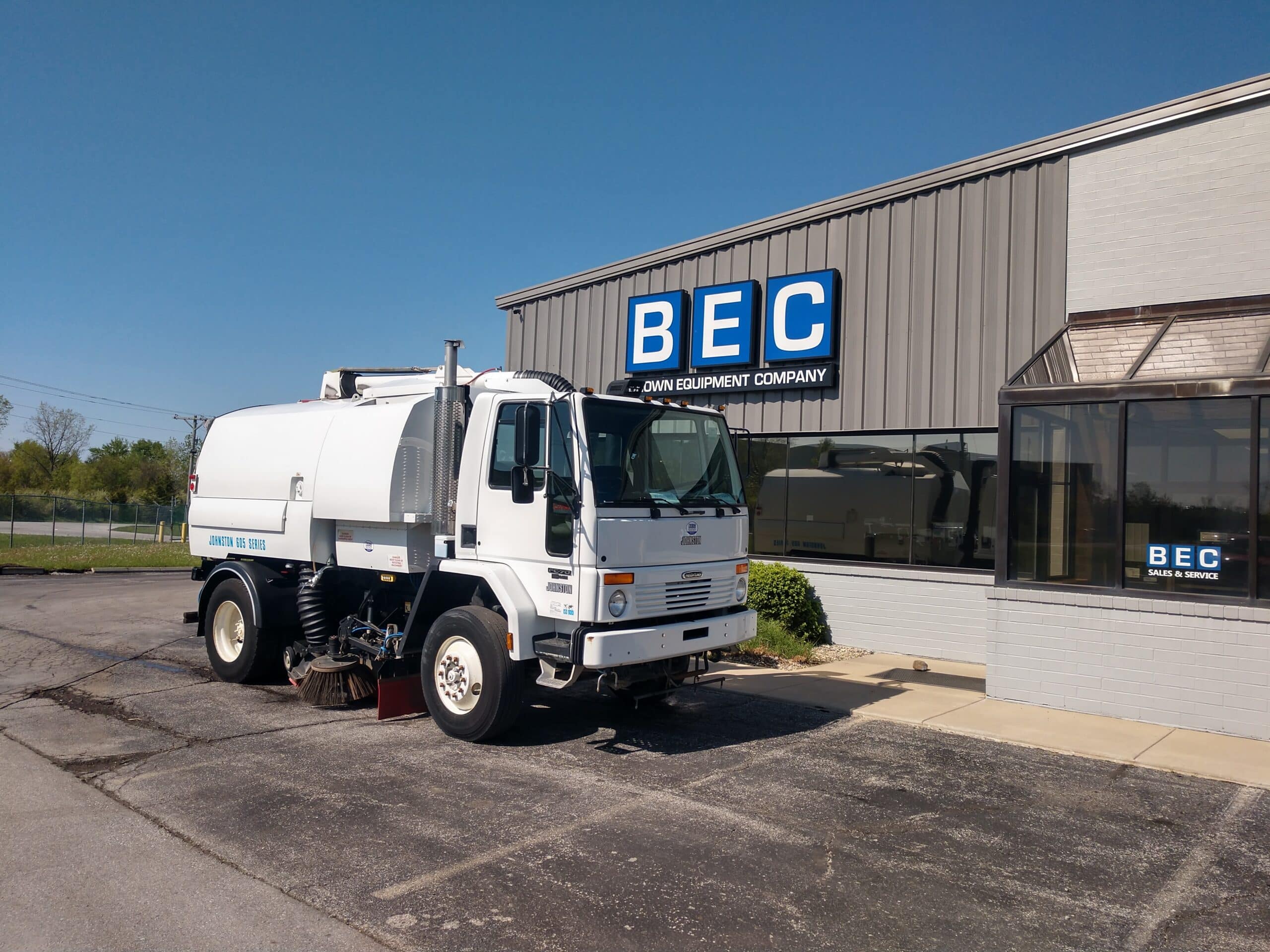 Johnston 605 street sweeper parked at BEC Equipment Company.