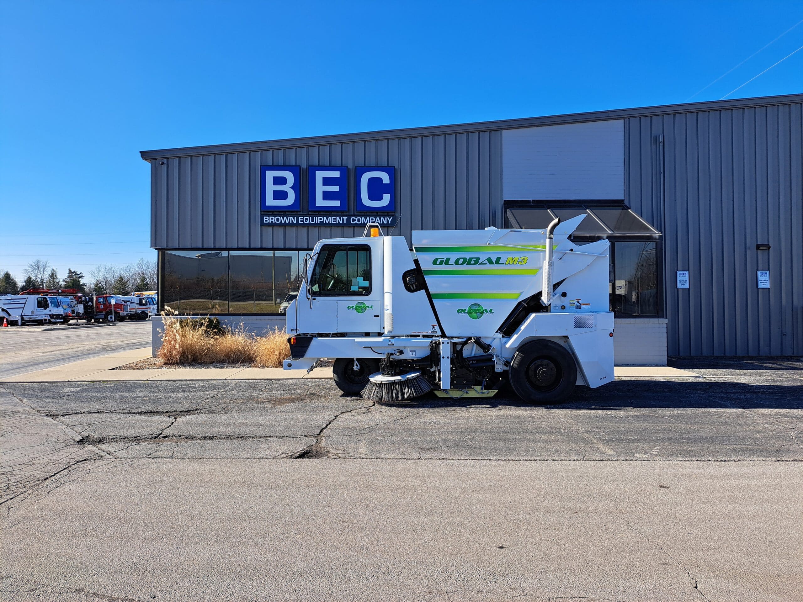Global M3 street sweeper parked outside Brown Equipment Company.