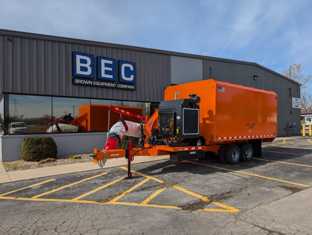 Leaf collection truck outside BEC Equipment Center.