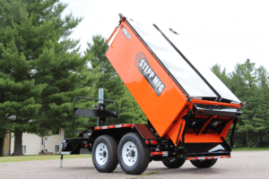 Heavy-duty dump trailer lifting for efficient material transport and hauling.