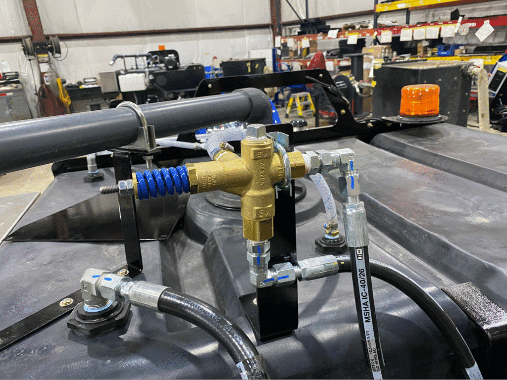 Fluid control valve system actively managing industrial fluids in a manufacturing environment.