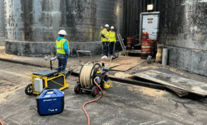 Crew members working efficiently and safely at a construction site.