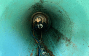 Inside view of a pipe highlighting inspection equipment for maintenance efficiency.