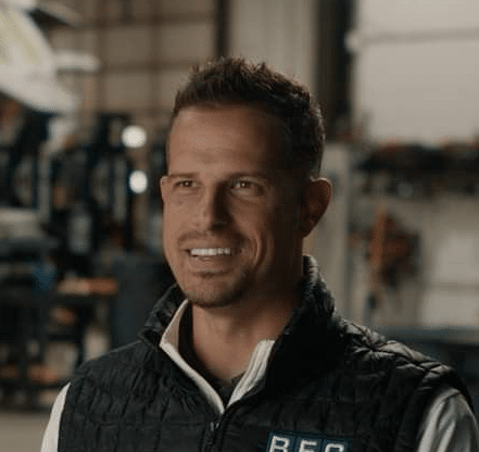 Professional interview with a smiling expert in a workshop setting.