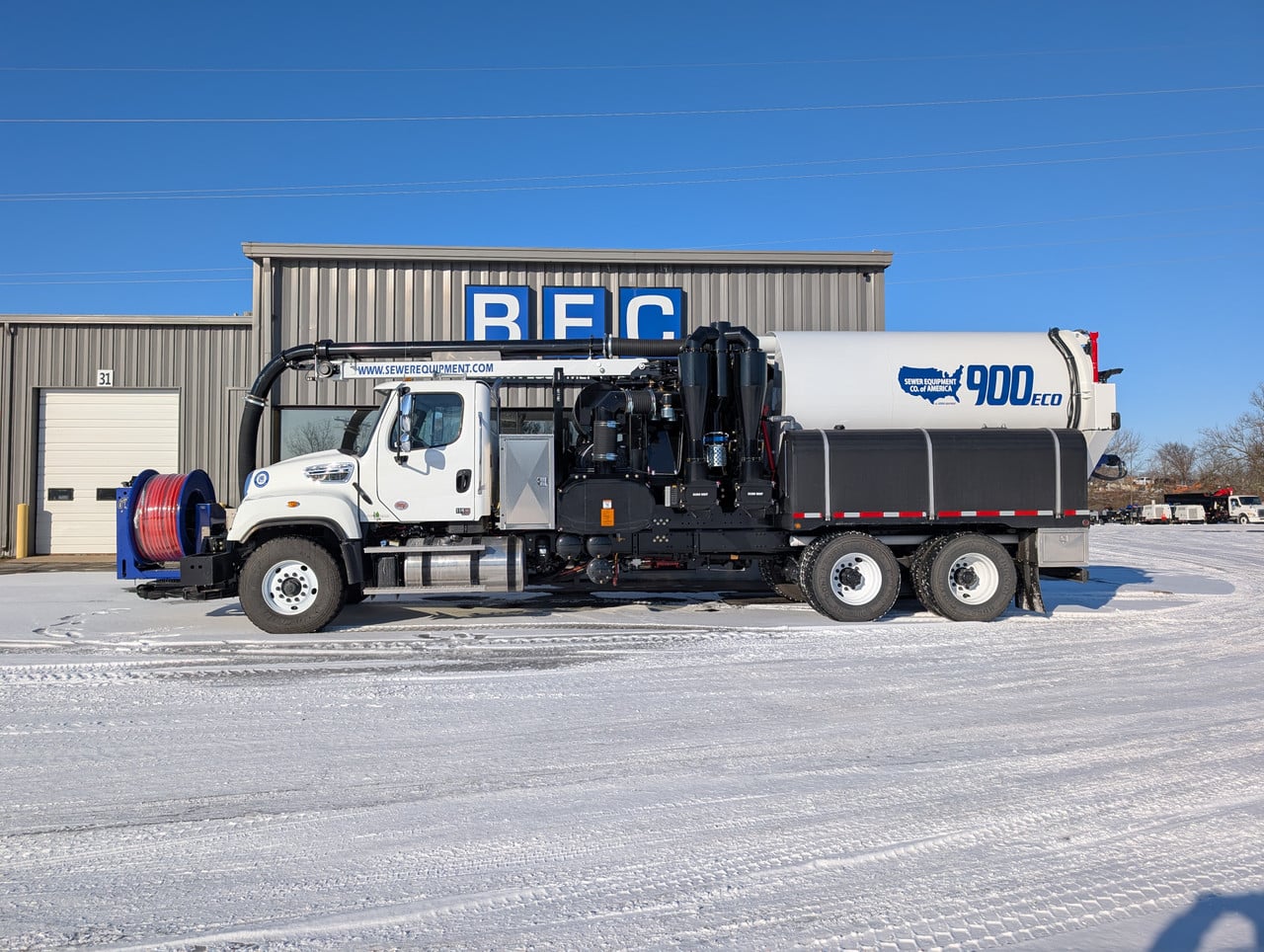 Sewer cleaning truck equipped for efficient waste removal and maintenance services.