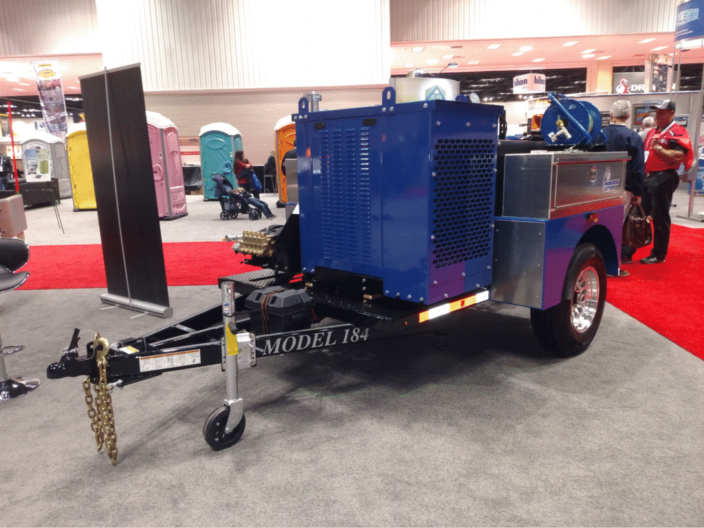 Model 184 sewer jetter trailer with advanced features showcased at the industrial trade show.