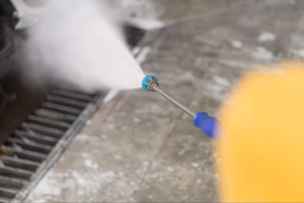High-pressure cleaning in action, effectively removing dirt and grime from surfaces.