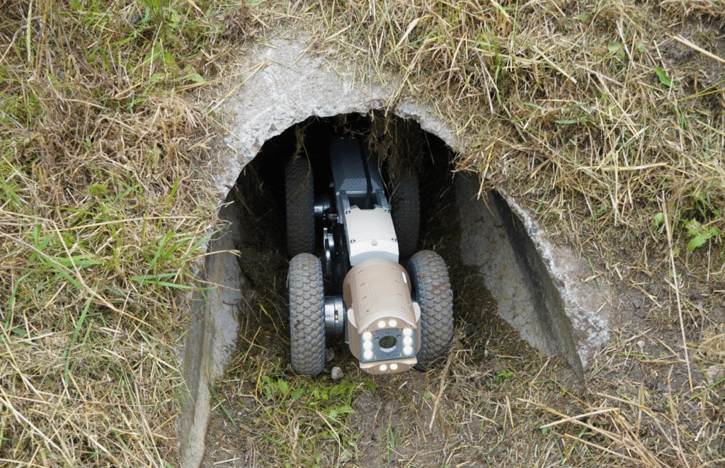 iBAK sewer inspection equipment exploring a burrow, showcasing advanced technology and underground research capabilities.