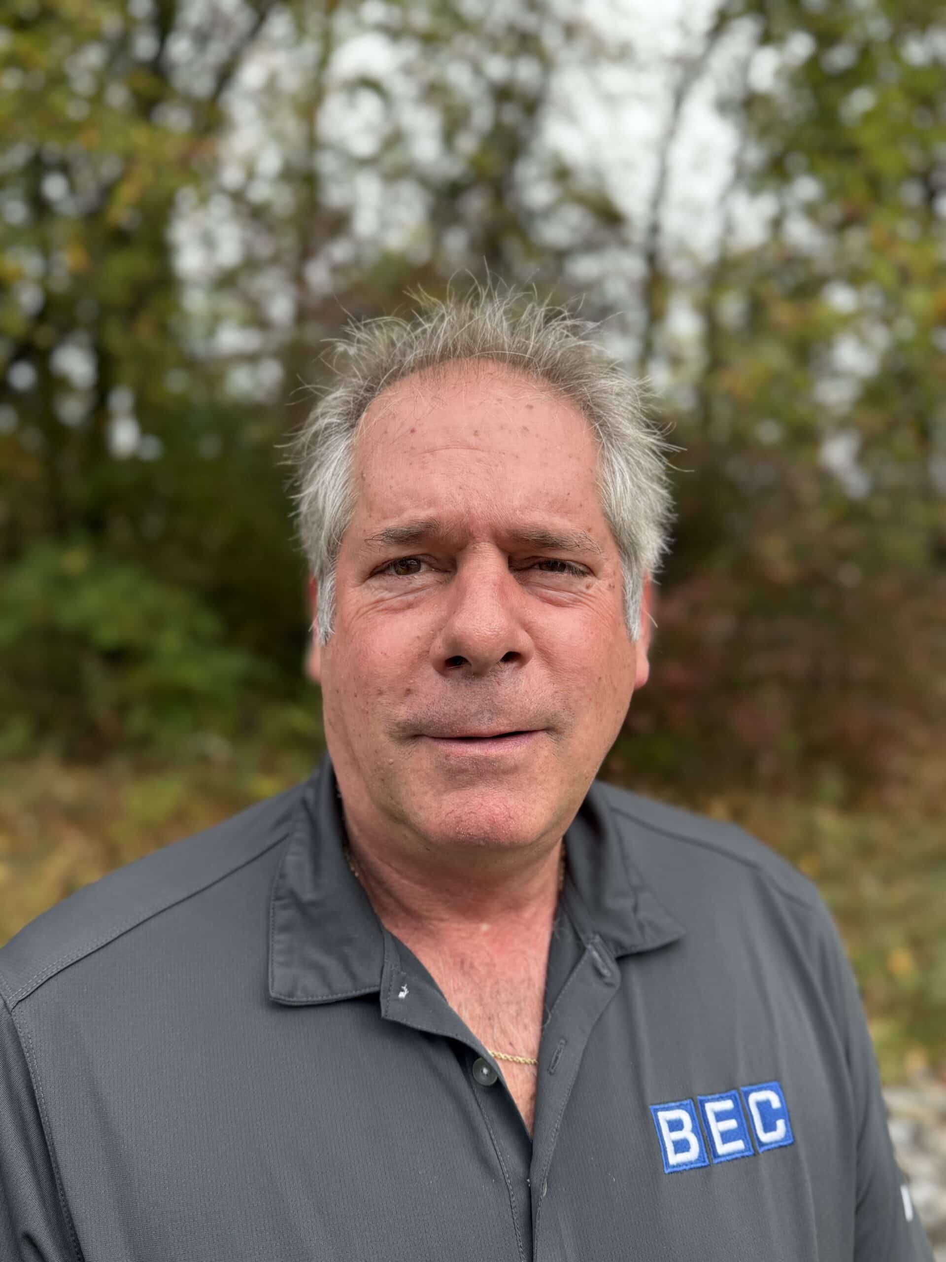 BEC team member portrait in nature, highlighting expertise and commitment.