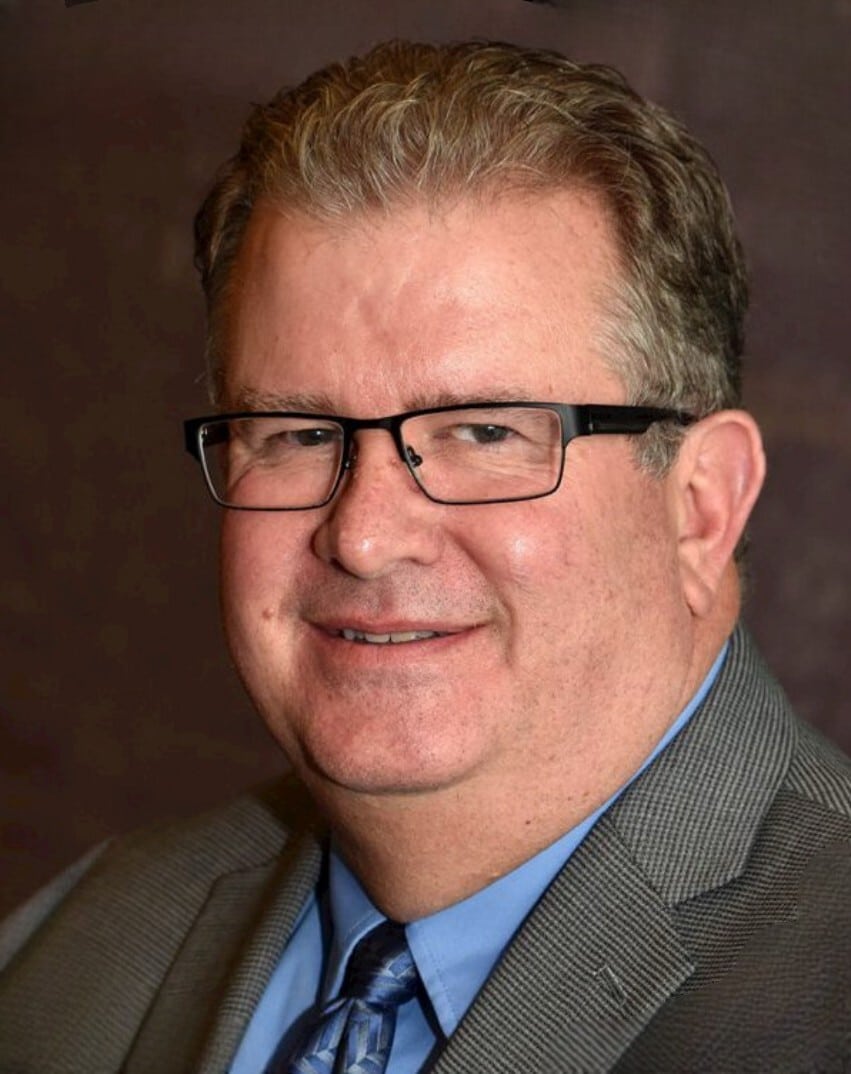 Professional businessman portrait showcasing confidence and professionalism in a business setting.