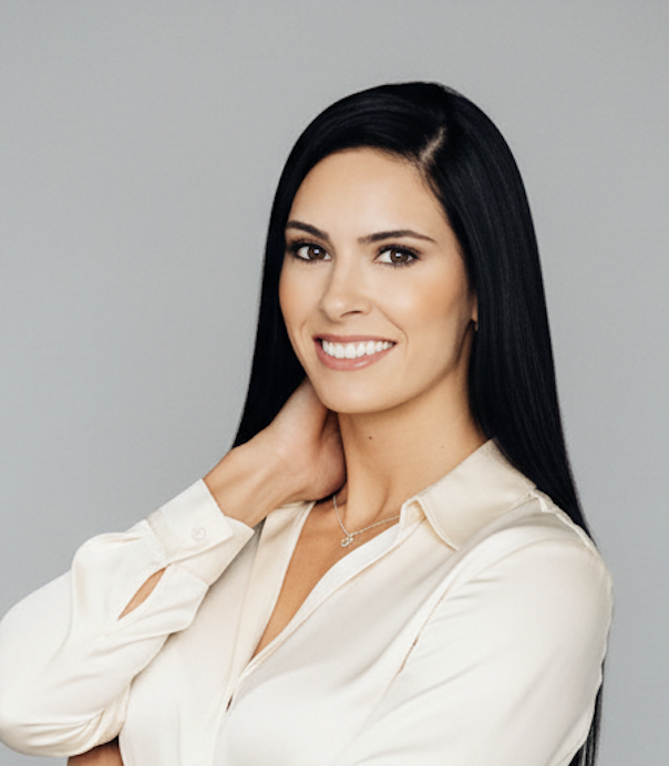 Jenna Lawrence, Equipment Consultant with long black hair in a professional light blouse.
