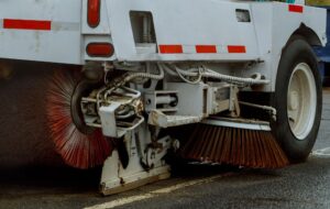 Urban street sweeper maintaining clean roads and enhancing city aesthetics.