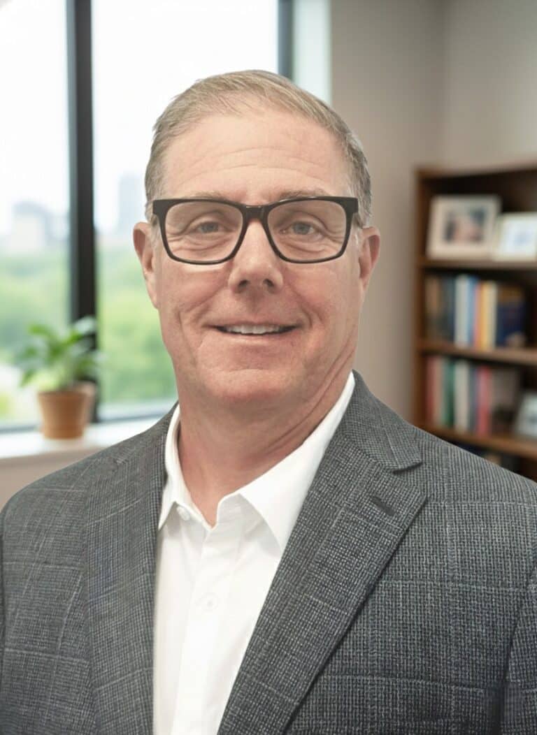 Portrait of Joseph Fischer, President of BEC, in a professional setting.