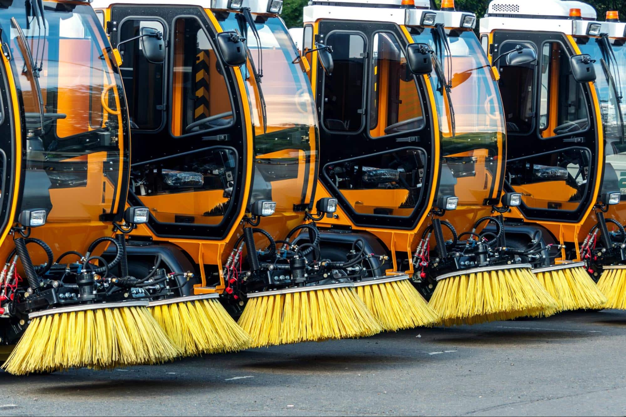 Street cleaning machines ready for efficient urban maintenance and debris removal.