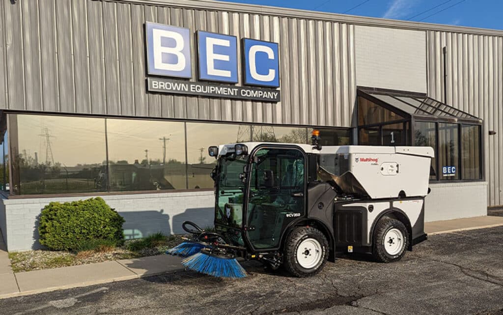 Innovative street sweeper on display at Brown Equipment Company facility.